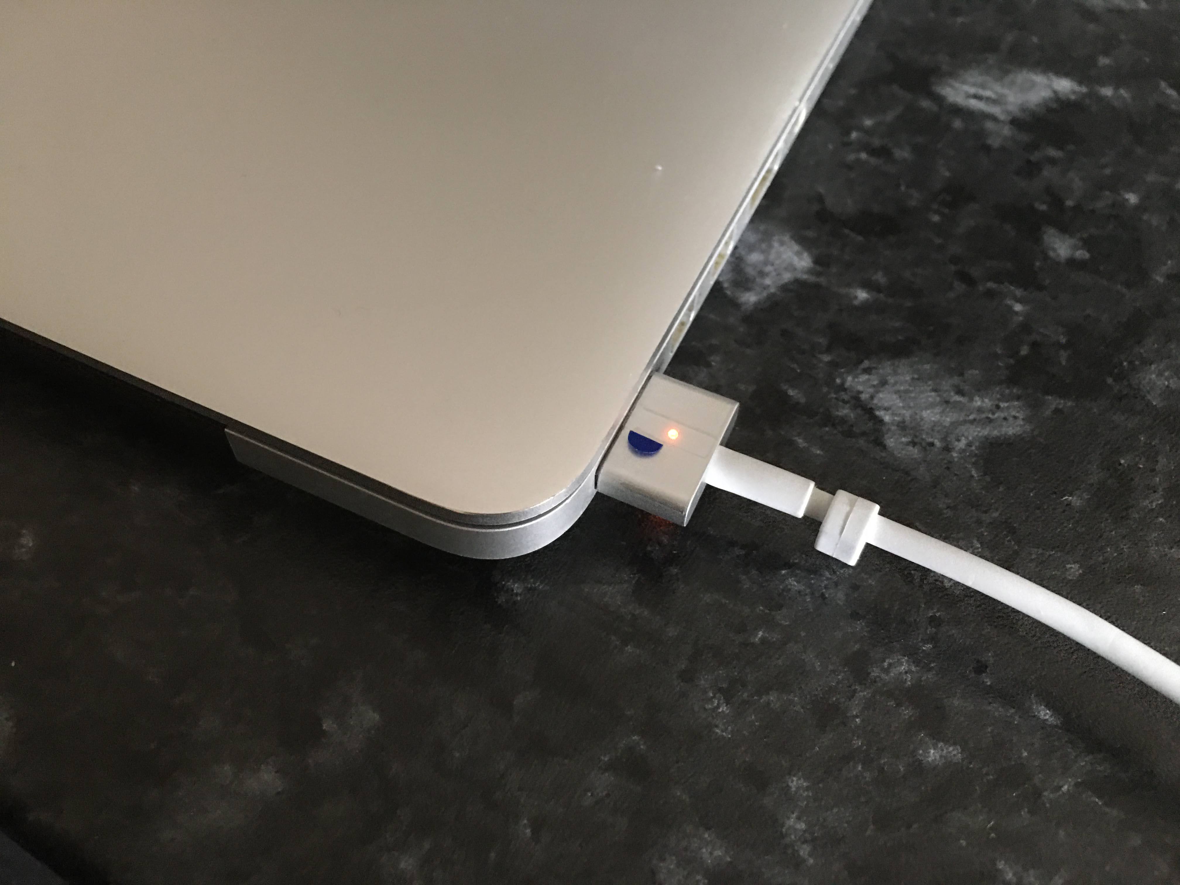 MagSafe Charger charging a Macbook
